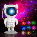 AstroGlow – Projetor Astronauta Galáxia Céu Estrelado | Nebulosa 360° · 8 Cores · Timer